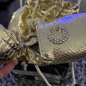 Joan Boyce Golden slipper shoe